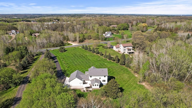 aerial view featuring a forest view