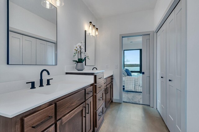 21070 Eagle Dr, Osakis, MN 56360 - bathroom with vanity, ensuite bathroom, and a closet
