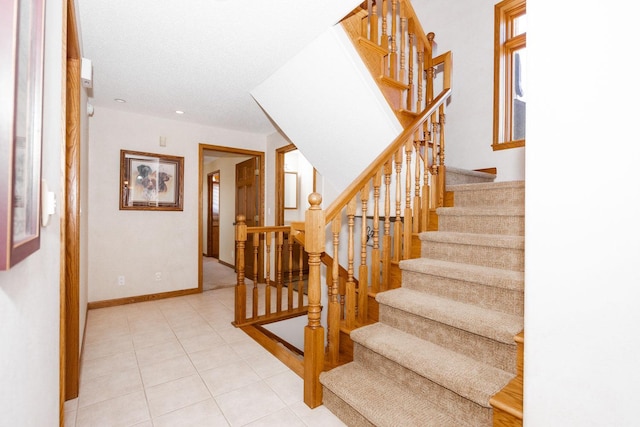 15671 Wermager Beach Rd, Lake Park, MN 56554 - staircase with tile patterned floors and baseboards