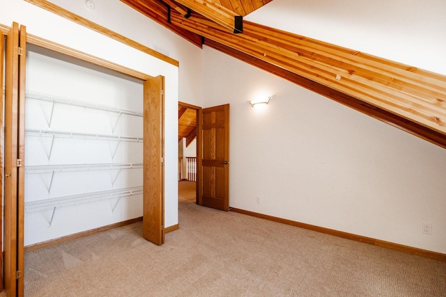 15671 Wermager Beach Rd, Lake Park, MN 56554 - bonus room featuring light colored carpet, lofted ceiling, and baseboards