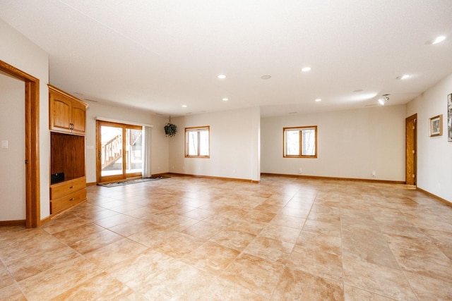 15671 Wermager Beach Rd, Lake Park, MN 56554 - empty room with recessed lighting, baseboards, and light tile patterned floors