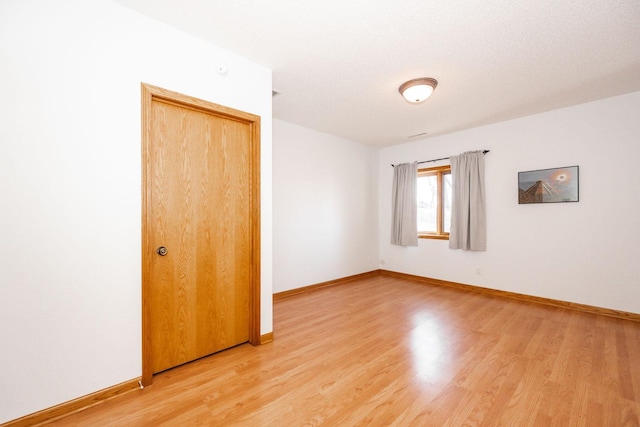 15671 Wermager Beach Rd, Lake Park, MN 56554 - empty room featuring light wood-style flooring and baseboards