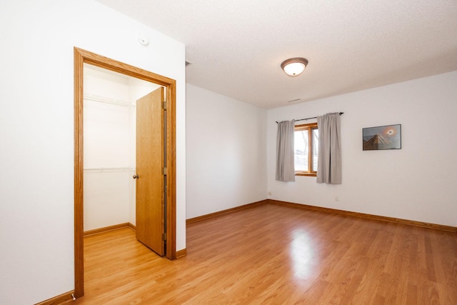15671 Wermager Beach Rd, Lake Park, MN 56554 - unfurnished room with light wood-style floors and baseboards