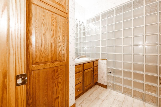 15671 Wermager Beach Rd, Lake Park, MN 56554 - bathroom with vanity and wood finished floors