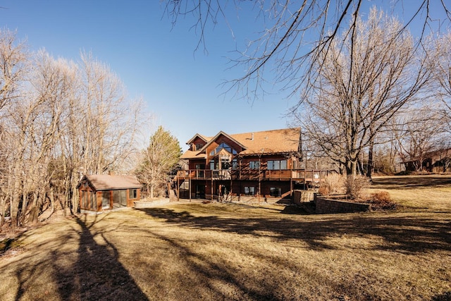 15671 Wermager Beach Rd, Lake Park, MN 56554 - rear view of property featuring a deck and an outbuilding