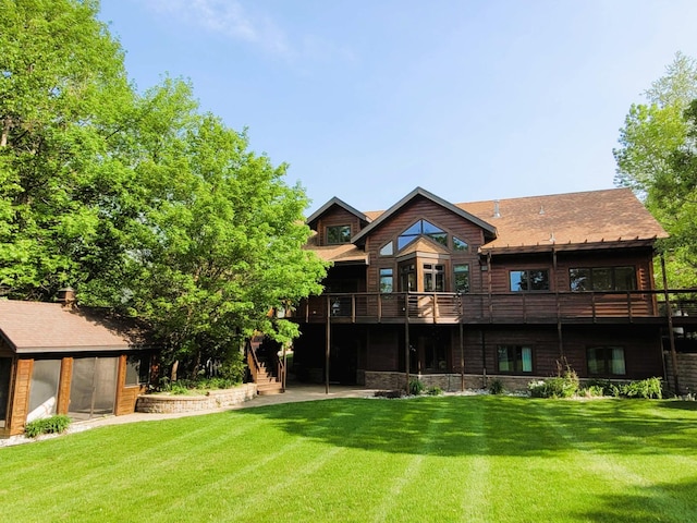 15671 Wermager Beach Rd, Lake Park, MN 56554 - rear view of house with a yard, stairs, and a wooden deck