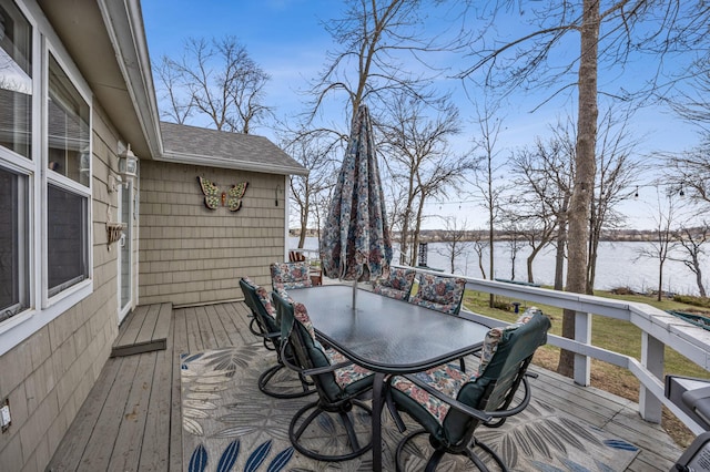 32331 Loon Dr, Candor Twp, MN 56587 - wooden deck with a water view and outdoor dining area