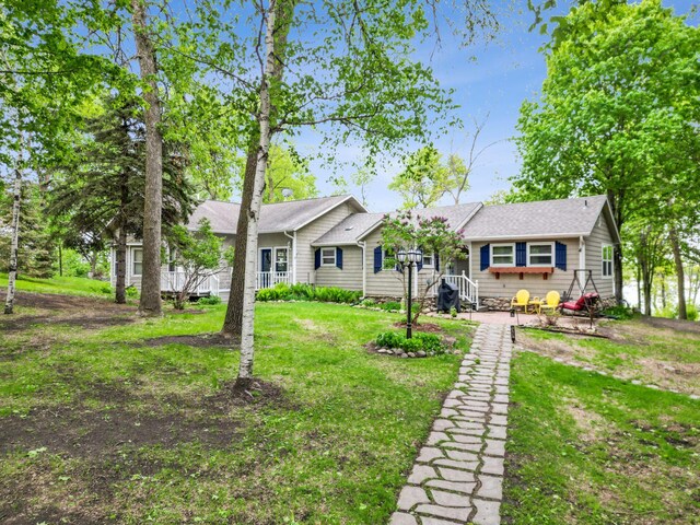 32331 Loon Dr, Candor Twp, MN 56587 - view of front of property featuring a front yard and a shingled roof