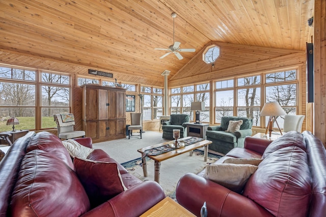 32331 Loon Dr, Candor Twp, MN 56587 - carpeted living area with healthy amount of natural light, a ceiling fan, wooden ceiling, high vaulted ceiling, and wood walls