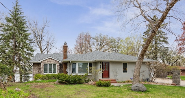 5427 Twin Lake Blvd E, Brooklyn Center, MN 55429 - ranch-style house featuring a front yard, a chimney, stucco siding, and stone siding