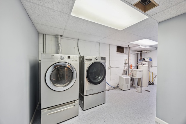 5427 Twin Lake Blvd E, Brooklyn Center, MN 55429 - washroom with independent washer and dryer and concrete block wall