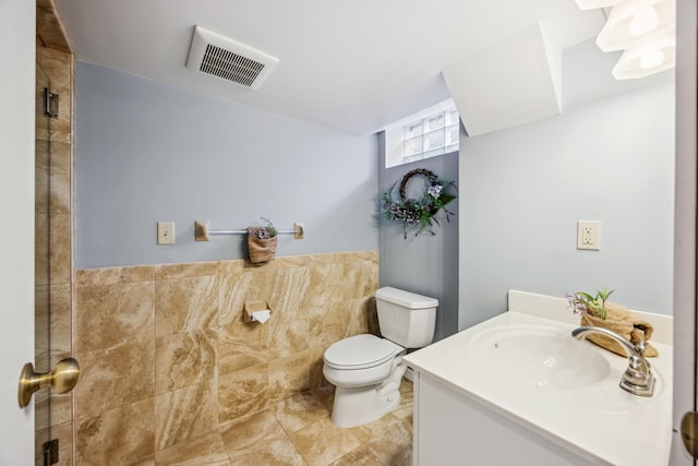 5427 Twin Lake Blvd E, Brooklyn Center, MN 55429 - bathroom featuring toilet, vanity, and a shower