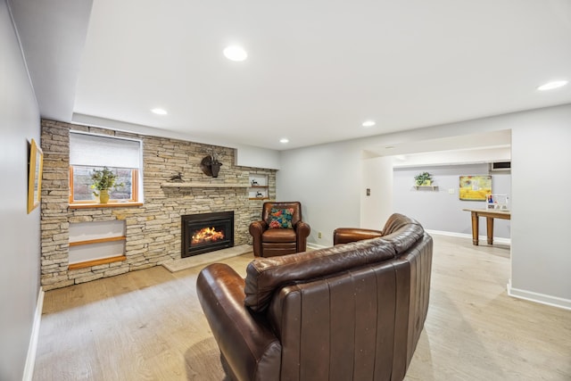 5427 Twin Lake Blvd E, Brooklyn Center, MN 55429 - living room with light wood finished floors, a fireplace, baseboards, and recessed lighting