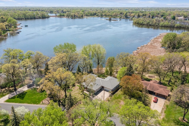 5427 Twin Lake Blvd E, Brooklyn Center, MN 55429 - aerial view of a nearby body of water and a heavily wooded area