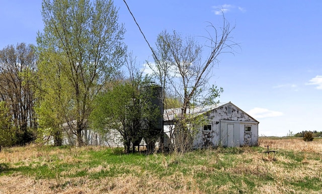 15535 375th St, Amador Twp, MN 55084 - view of yard with an outdoor structure and a barn