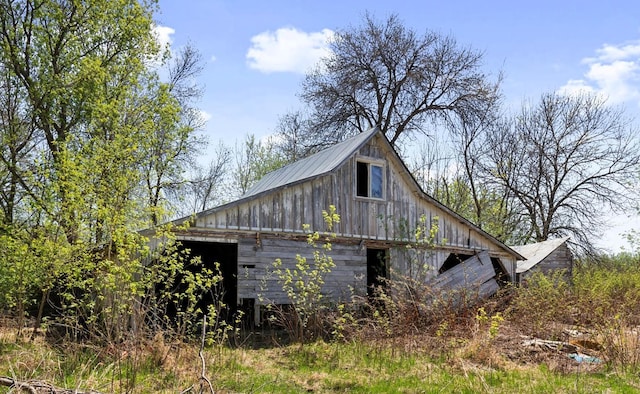 15535 375th St, Amador Twp, MN 55084 - view of property exterior with a barn, an outdoor structure, and board and batten siding
