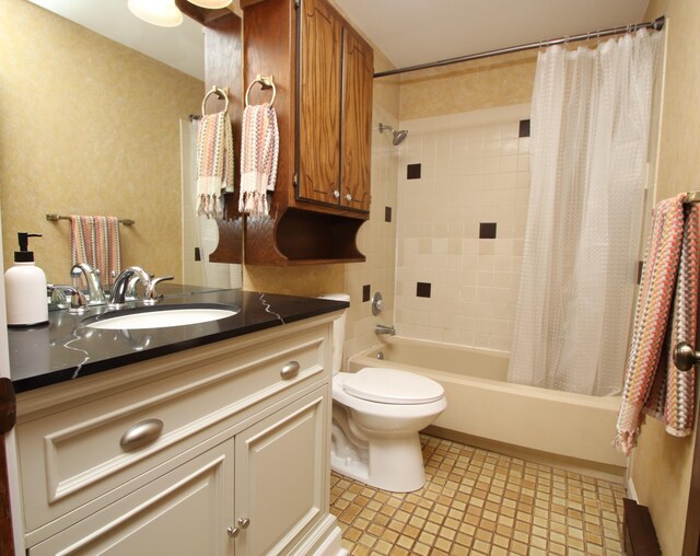 full bathroom featuring vanity, toilet, and shower / tub combo with curtain