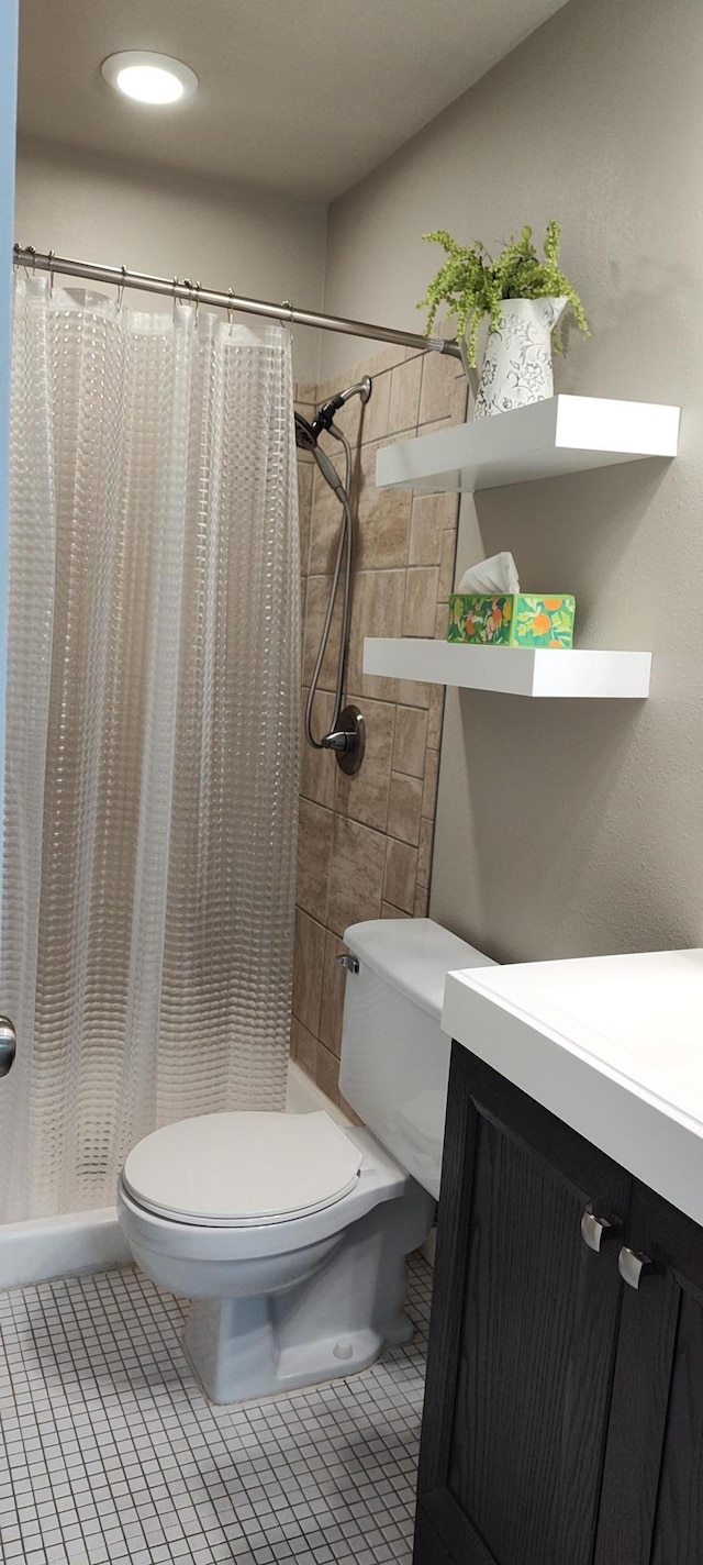2520 Le Homme Dieu Hts NE Unit 3, Alexandria Twp, MN 56308 - bathroom with toilet, a shower with shower curtain, vanity, and tile patterned floors