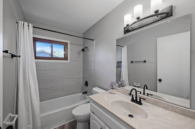 full bathroom featuring toilet, vanity, shower / bath combination with curtain, and a textured ceiling