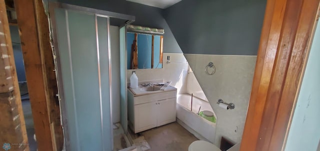 721 Front St, Hawley, MN 56549 - bathroom with vanity and a tub to relax in