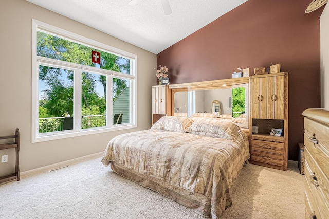 7232 Kestrel Trl, Savage, MN 55378 - carpeted bedroom featuring lofted ceiling, baseboards, a ceiling fan, and a textured ceiling
