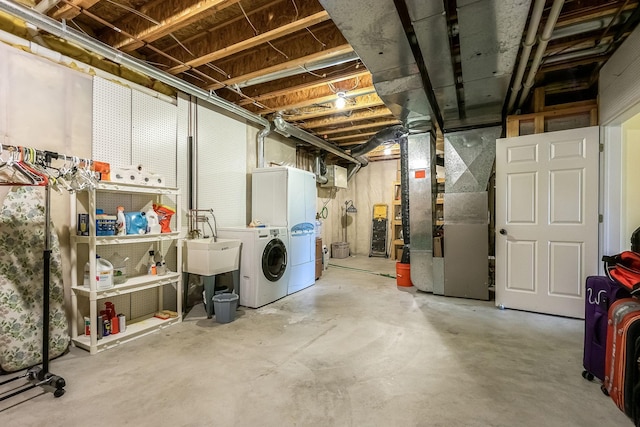 7232 Kestrel Trl, Savage, MN 55378 - unfinished basement featuring washing machine and dryer, heating unit, and a sink
