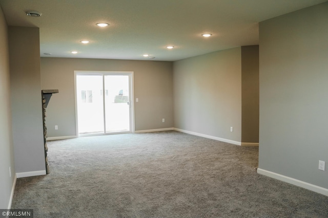 1102 2nd St NW, Delano, MN 55328 - spare room featuring carpet flooring, recessed lighting, and baseboards