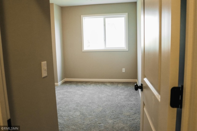 1102 2nd St NW, Delano, MN 55328 - carpeted spare room with baseboards