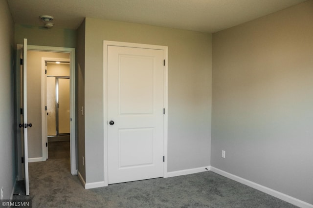 1102 2nd St NW, Delano, MN 55328 - unfurnished bedroom with carpet flooring and baseboards