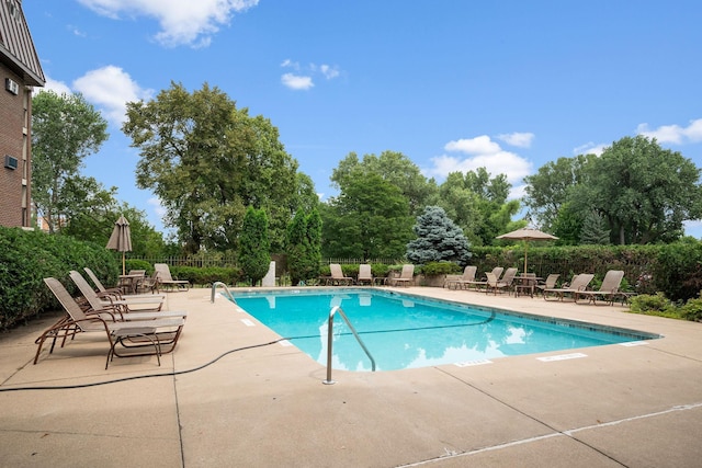 4860 Park Commons Dr Unit 314, Saint Louis Park, MN 55416 - community pool with a patio area and view of scattered trees