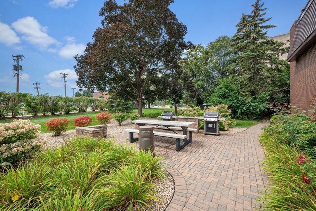 4860 Park Commons Dr Unit 314, Saint Louis Park, MN 55416 - view of patio with a grill