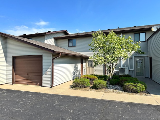 29465 422nd Ave, Otter Tail Twp, MN 56515 - townhome / multi-family property featuring a cooling unit and an attached garage