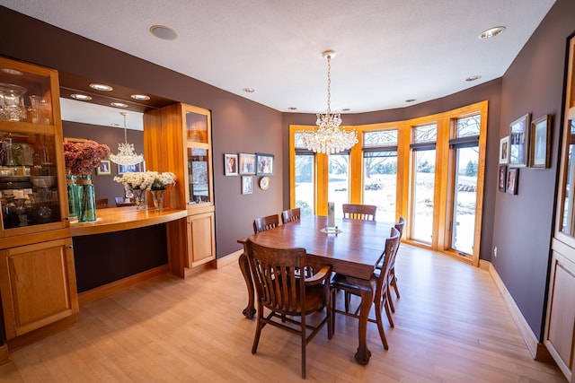 2300 County Road 92, Minnetrista, MN 55359 - dining room featuring a chandelier, light wood finished floors, and recessed lighting