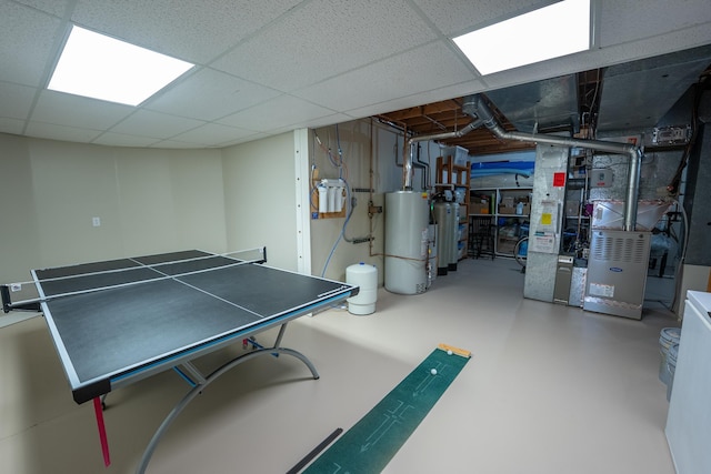 2300 County Road 92, Minnetrista, MN 55359 - game room featuring gas water heater, finished concrete floors, and a drop ceiling