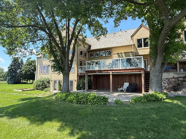 2300 County Road 92, Minnetrista, MN 55359 - rear view of house with a patio, a yard, and a deck