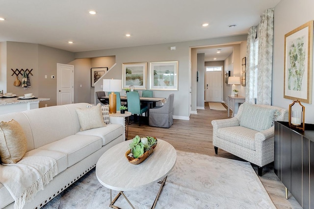 1001 Stone Creek Dr, Jordan, MN 55352 - living room featuring light wood-type flooring, recessed lighting, and baseboards