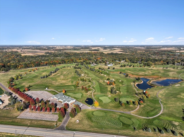 1001 Stone Creek Dr, Jordan, MN 55352 - aerial view of property's location featuring a nearby body of water, a local golf course, and a tree filled landscape