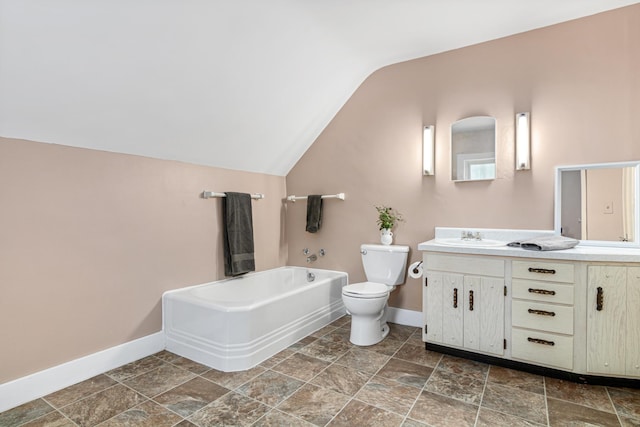 bathroom with lofted ceiling, baseboards, toilet, a bath, and vanity