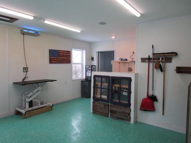 miscellaneous room with baseboards