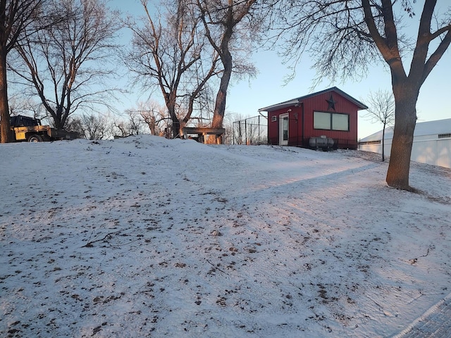 view of yard layered in snow