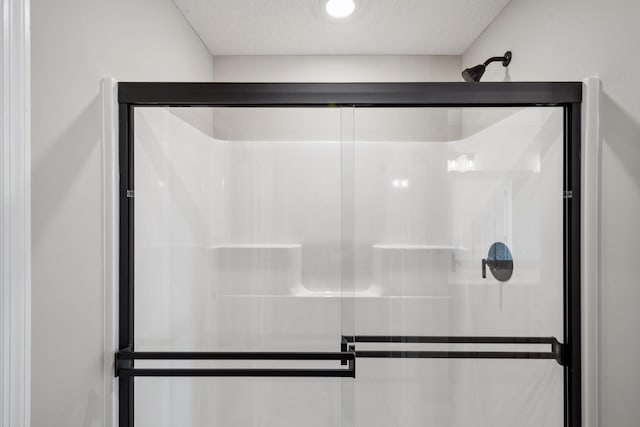 full bathroom with a stall shower
