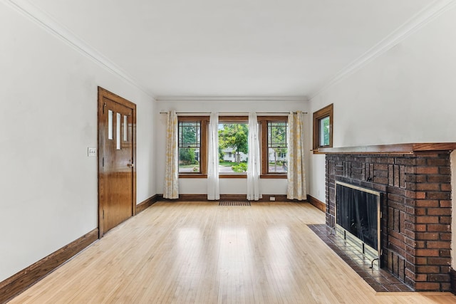 4228 Minnehaha Ave, Minneapolis, MN 55406 - unfurnished living room with a fireplace, baseboards, wood finished floors, and crown molding