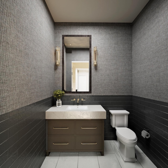 16474 48th Pl N, Plymouth, MN 55446 - bathroom with tile walls, tile patterned floors, vanity, and toilet