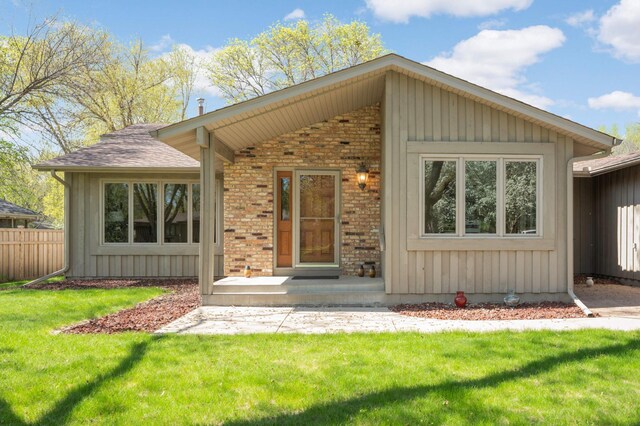 view of front of home with brick siding