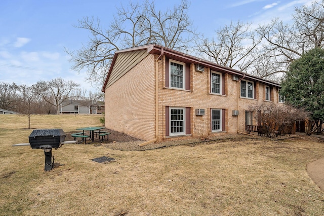 4500 Cedar Lake Rd S Unit 8, Saint Louis Park, MN 55416 - view of front of home with a front yard and brick siding