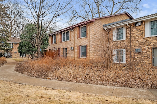 4500 Cedar Lake Rd S Unit 8, Saint Louis Park, MN 55416 - view of side of property with brick siding