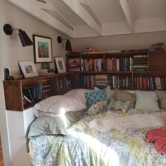 bedroom featuring beamed ceiling