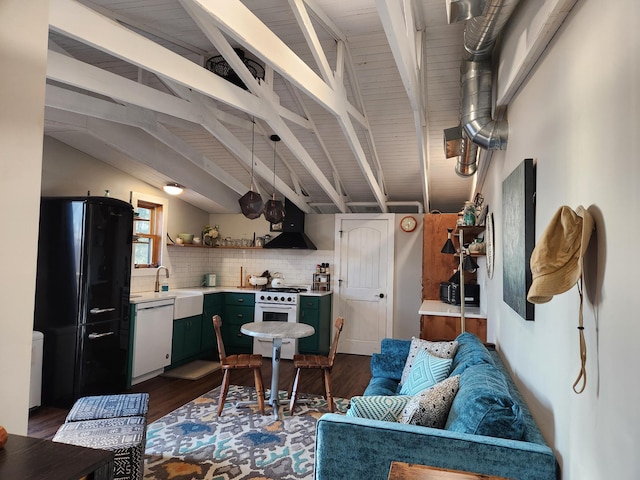 living room featuring lofted ceiling with beams and dark wood finished floors