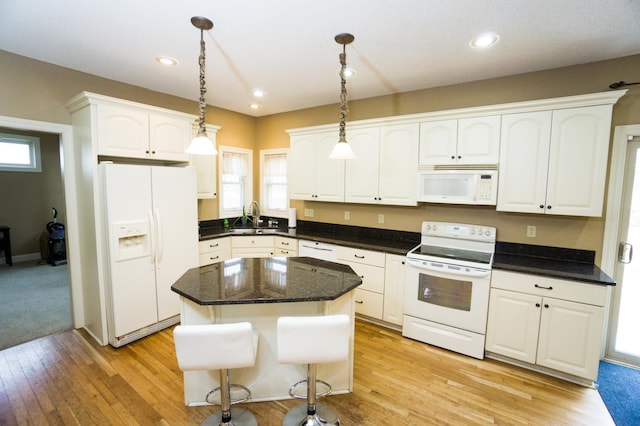 11474 Laketowne Dr, Albertville, MN 55301 - kitchen with white appliances, a sink, white cabinetry, pendant lighting, and light wood-style flooring