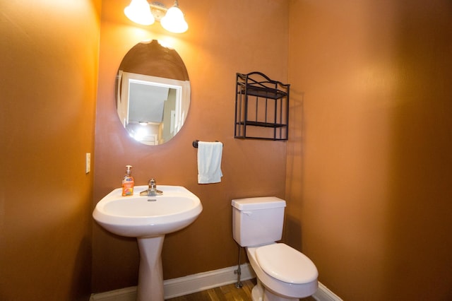 11474 Laketowne Dr, Albertville, MN 55301 - half bathroom featuring toilet and baseboards